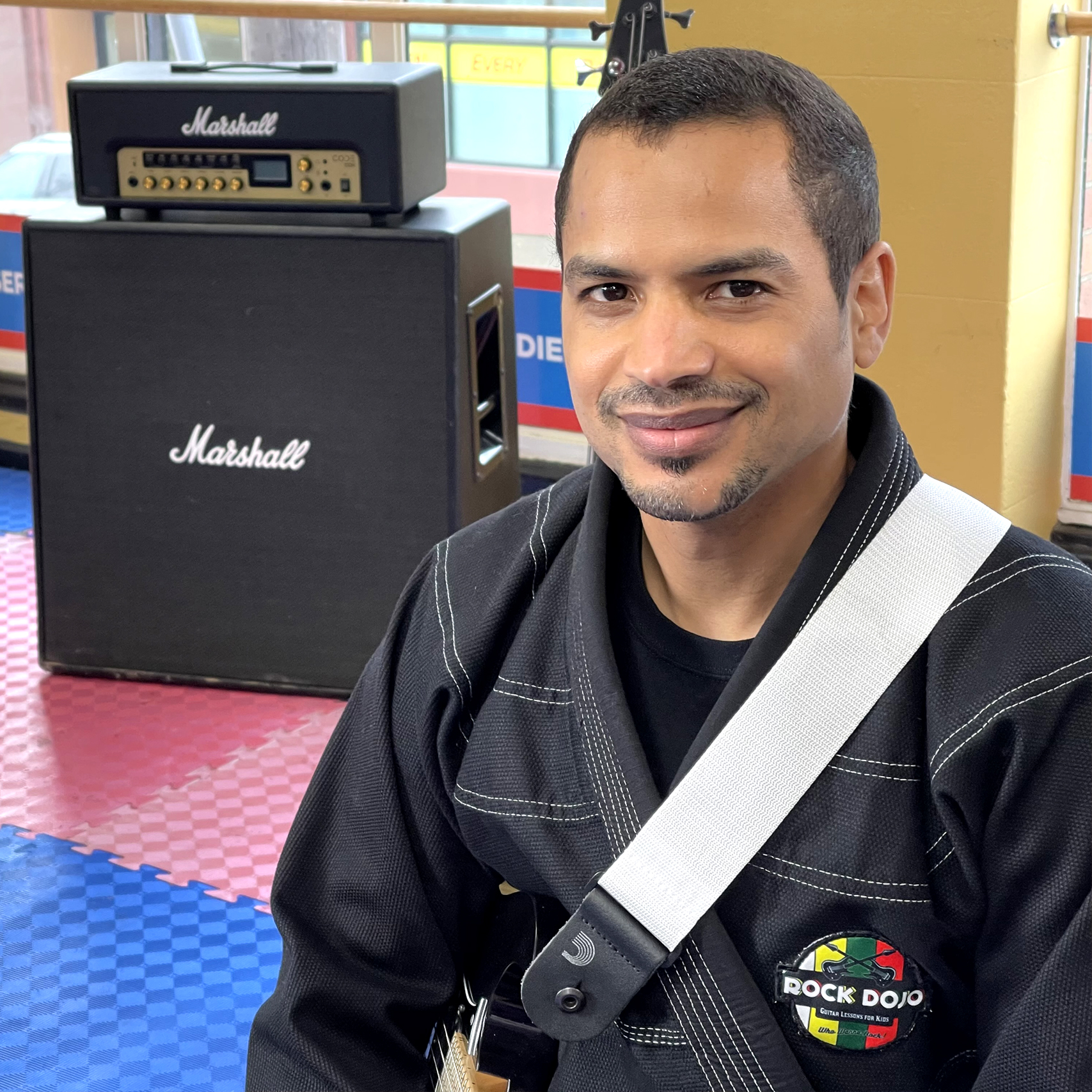 Brian Parham, founder and lead instructor of Rock Dojo, teaching online guitar lessons for kids