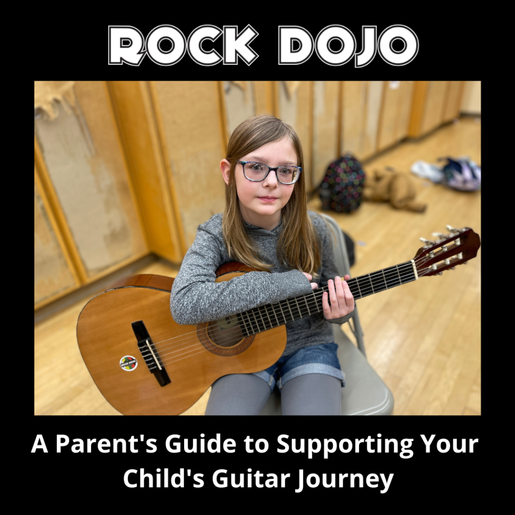 An eight-year-old girl playing guitar with a smile on her face in a Rock Dojo after-school program for guitar lessons for kids.