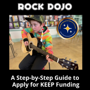 Rock Dojo student playing guitar with intense focus, benefiting from KEEP funding for music education.
